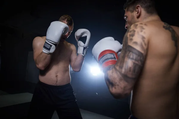 two men boxing