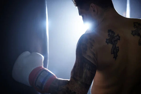 Young man in boxing gloves — Stock Photo, Image