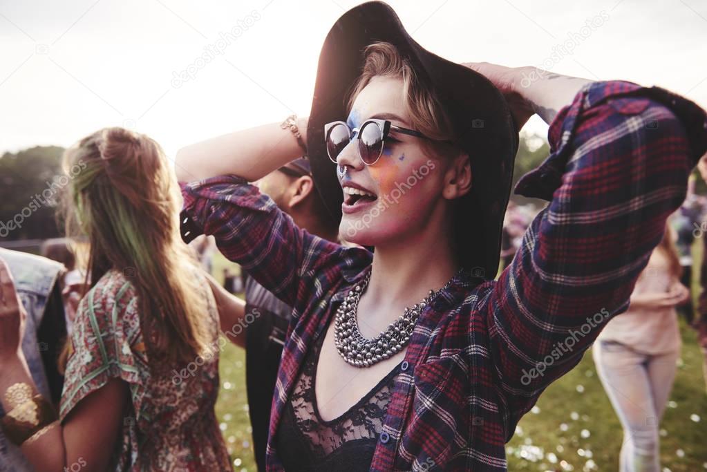Woman celebrating summer festival with friends
