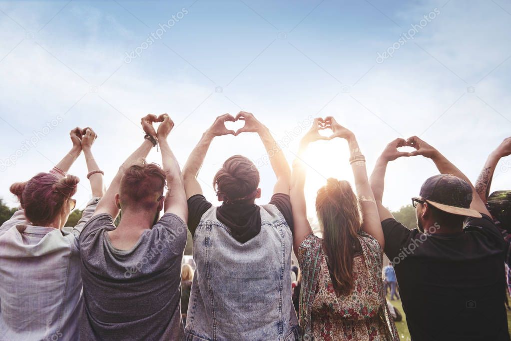 Group of people showing the heart shape 