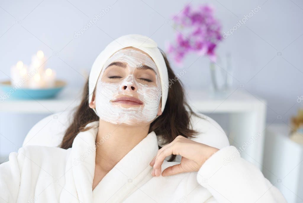 woman getting face treatment