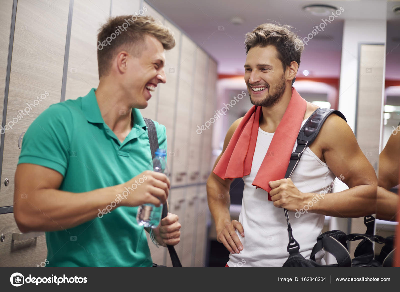 Two Men In Locker Room Stock Photo C Gpointstudio 162848204