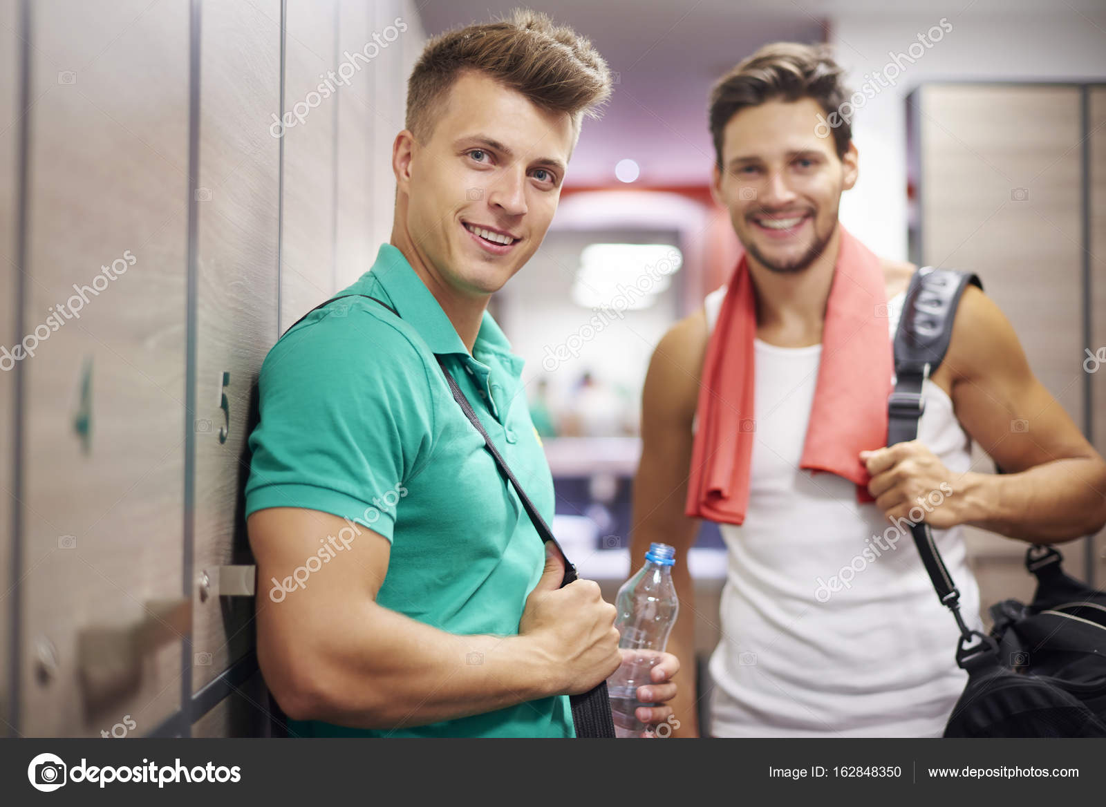 Two Men In Locker Room Stock Photo C Gpointstudio 162848350