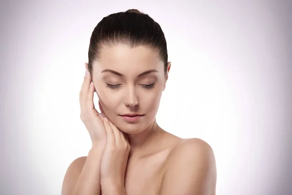 Woman with hands next to face — Stock Photo, Image