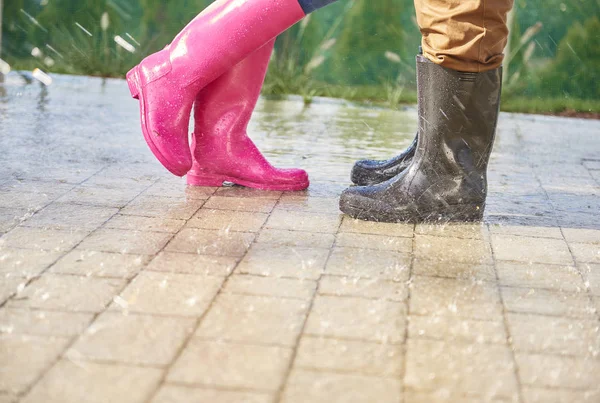 Man and woman in rubber boots — Stock Photo, Image