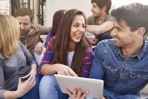 Friends using digital tablet — Stock Photo, Image