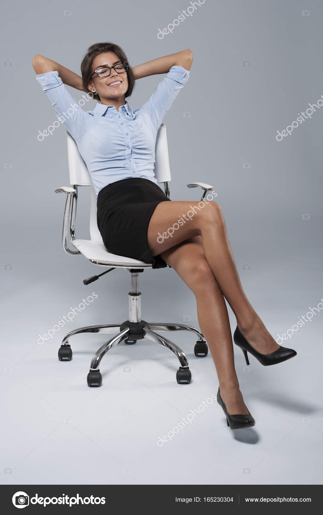 Woman Relaxing In Office Chair Stock Photo Gpointstudio 165230304 Woman Relaxing In Office Chair Stock Photo