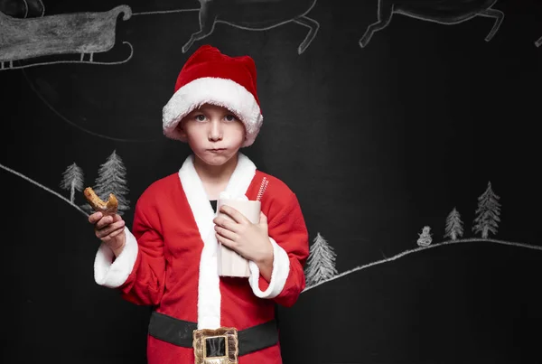 Niño disfrazado de Papá Noel —  Fotos de Stock