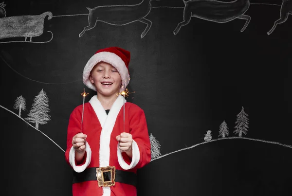 Chłopiec przebrany za Świętego Mikołaja — Zdjęcie stockowe