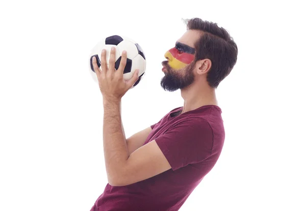 Enthusiast of soccer kissing a soccer ball — Stock Photo, Image