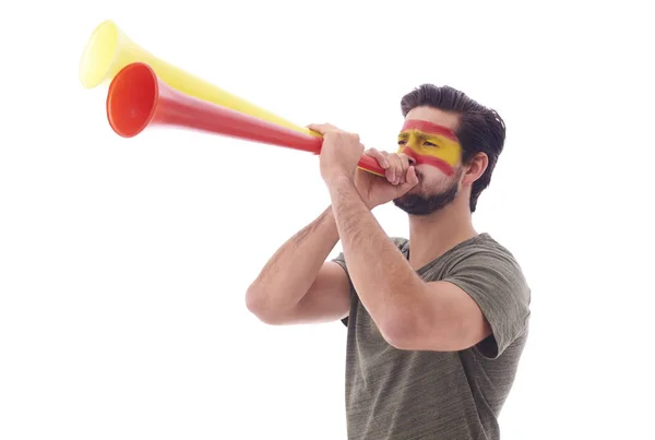 Tifoso di calcio spagnolo che soffia una vuvuzela — Foto Stock