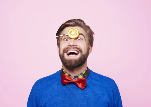 Bizarre man with lollipop having a fun — Stock Photo, Image