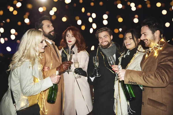 Group of friends celebrating new year together