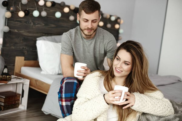 Portrait of happy couple drinking coffee