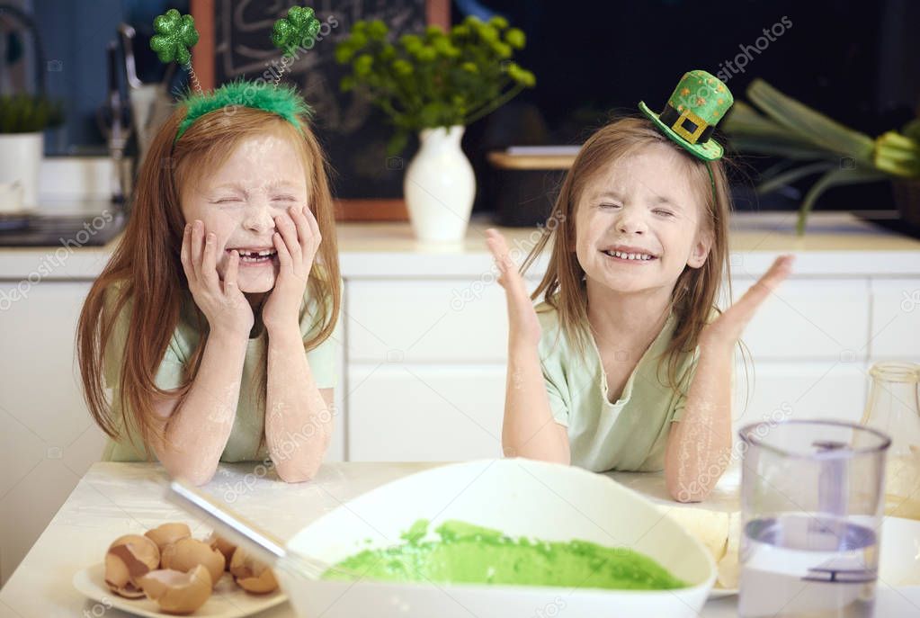 Playful kids enjoying with the flour 