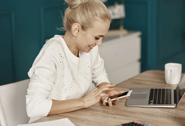 Cheerful Woman Reading Text Message Home Office — Stock Photo, Image