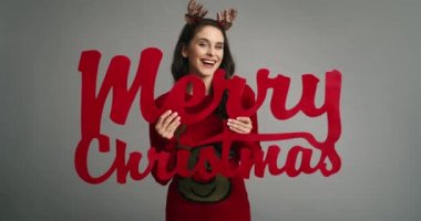 Noel için en iyi dileklerle inek bir kadın.