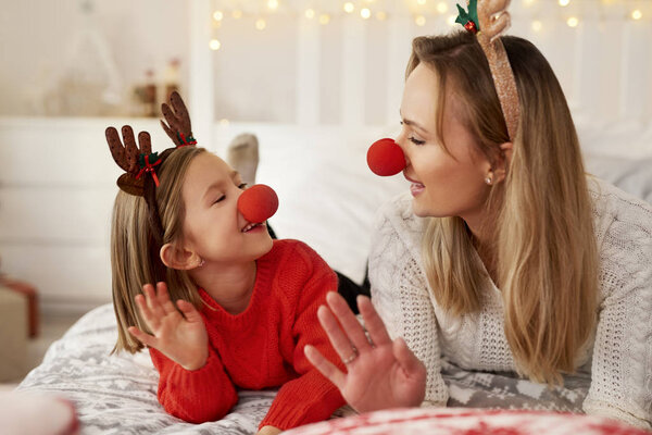 Mom and daughter enjoying the Christmas 