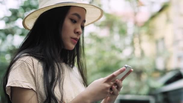 Handheld View Focused Woman Using Mobile Phone — 비디오