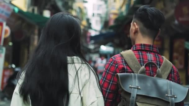 Handheld View Couple Walking Vietnamese Street — 비디오