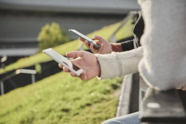 Close up of couple with mobile phone 