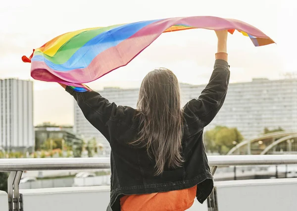 Rear View Young Woman Waving Rainbow Flag — Stock Photo, Image