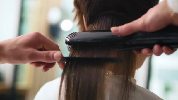 Handheld View Hairstylist Using Straightener Work Shot Red Helium Camera — Stock Video