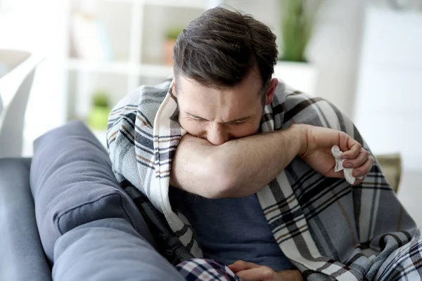 Man Coughing His Elbow — Stock Photo, Image