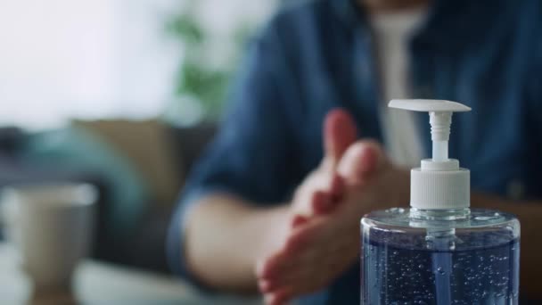 Man Disinfecting His Hands Starting Work Shot Red Helium Camera — Stock Video