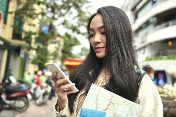 Asian Woman Passport Paper Map Using Mobile Phone — Stock Photo, Image