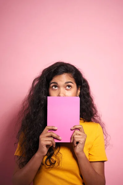 Young African Woman Notebook Covering Her Mouth — Stock Photo, Image