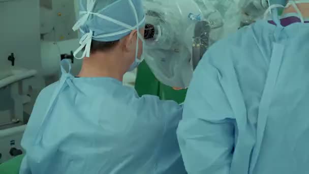 Surgeon Performs Surgery Human Skull Electron Microscope Operating Room — Stock Video