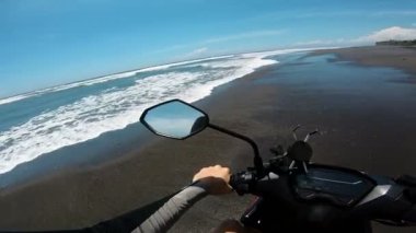 Denizde kumda motosiklet sürmek, ilk insan olmak.