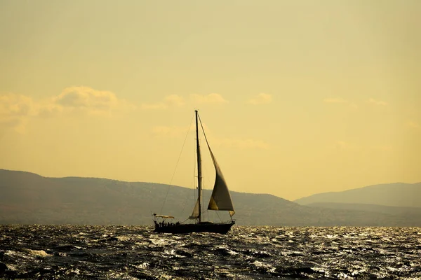 Sailing Yacht in the Sun Backlight