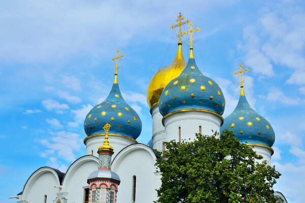 Sergiev Posad, Moscow region, Russia - August 15, 2019: Trinity-Sergiev Lavra, the most important Russian monastery, Domes of the Assumption Cathedral
