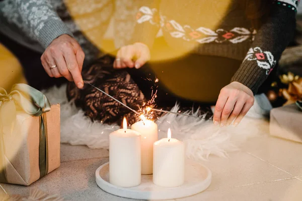 Man Woman Ignite Sparklers Christmas Tree Decor Home — Stock Photo, Image