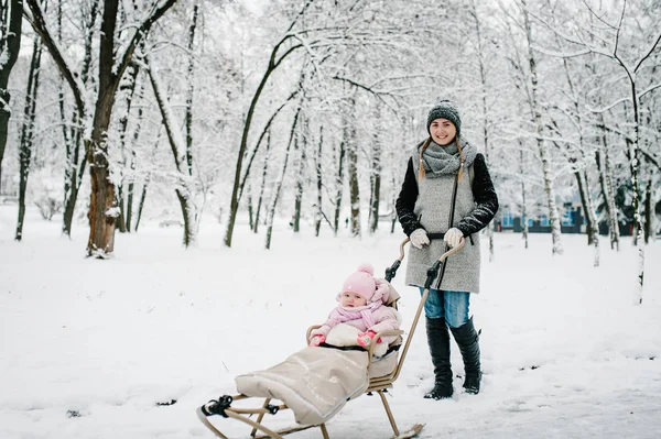 Portrait Happy Young Mother Daughter Stand Baby Children Sled Outdoors — Stock Photo, Image