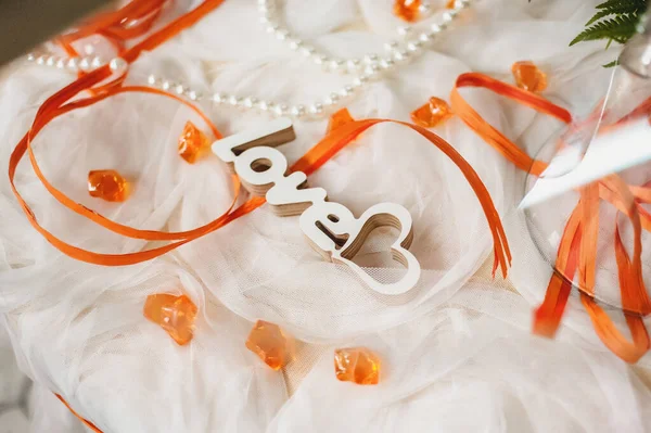 Carved Wooden Word Love Tulle Orange Ribbons — Stock Photo, Image