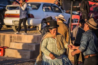 Copacabana - July 29, 2017: Local Bolivians dancing in the town  clipart