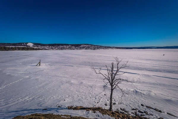 Rattvik - March 30, 2018: Panorama of the frozen lake Siljan in Rattvik, Dalarna, Sweden