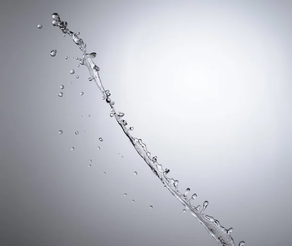 Moving water on white background — Stock Photo, Image