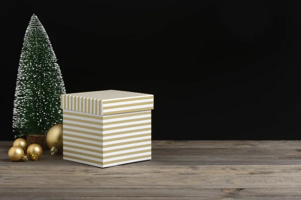 Box Golden White Stripes Wooden Black Background — Stock Photo, Image