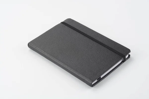 Μαύρο Σημειωματάριο Καουτσούκ Λευκό Φόντο — Φωτογραφία Αρχείου