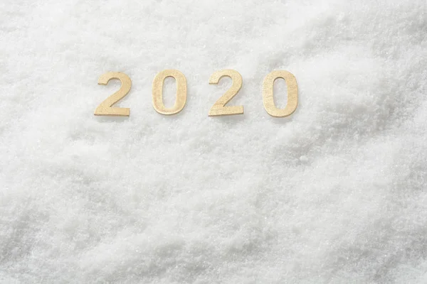 Año Nuevo 2020 en números sobre fondo de nieve — Foto de Stock