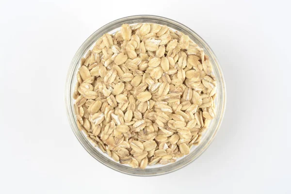 Oat in grain in a glass bowl — Stock Photo, Image