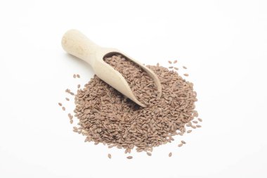 Brown linen in a wooden spoon