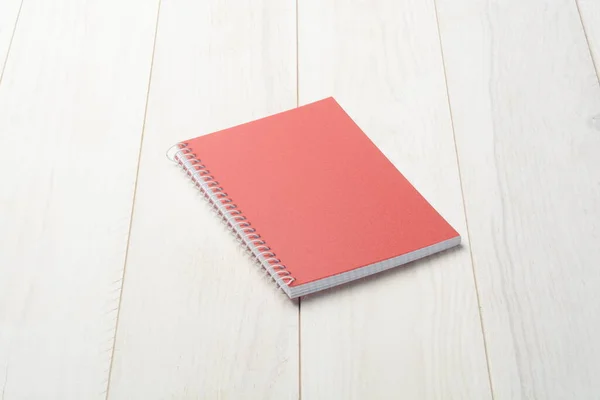 Closed Red Cover Notebook White Wooden Background Closed Notebook — Stock Photo, Image