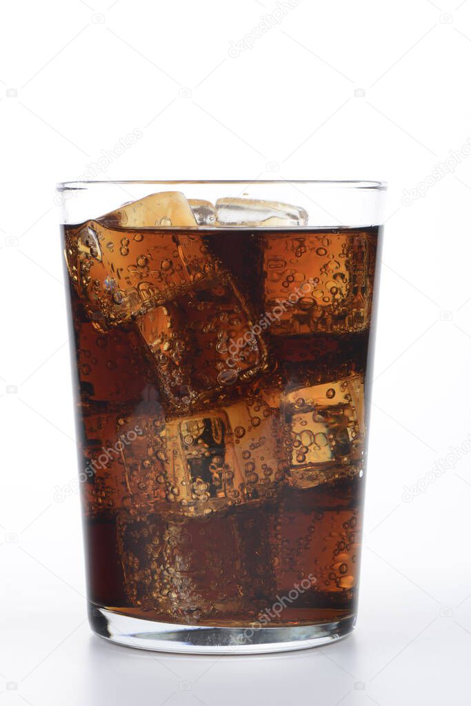 Glass of cola drink with ice on white background