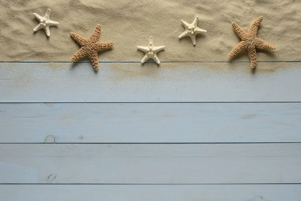 Starfish Blue Wooden Background Sand Top View — Stock Photo, Image