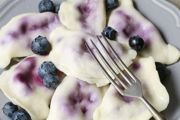 Dumplings with blueberries — Stock Photo, Image